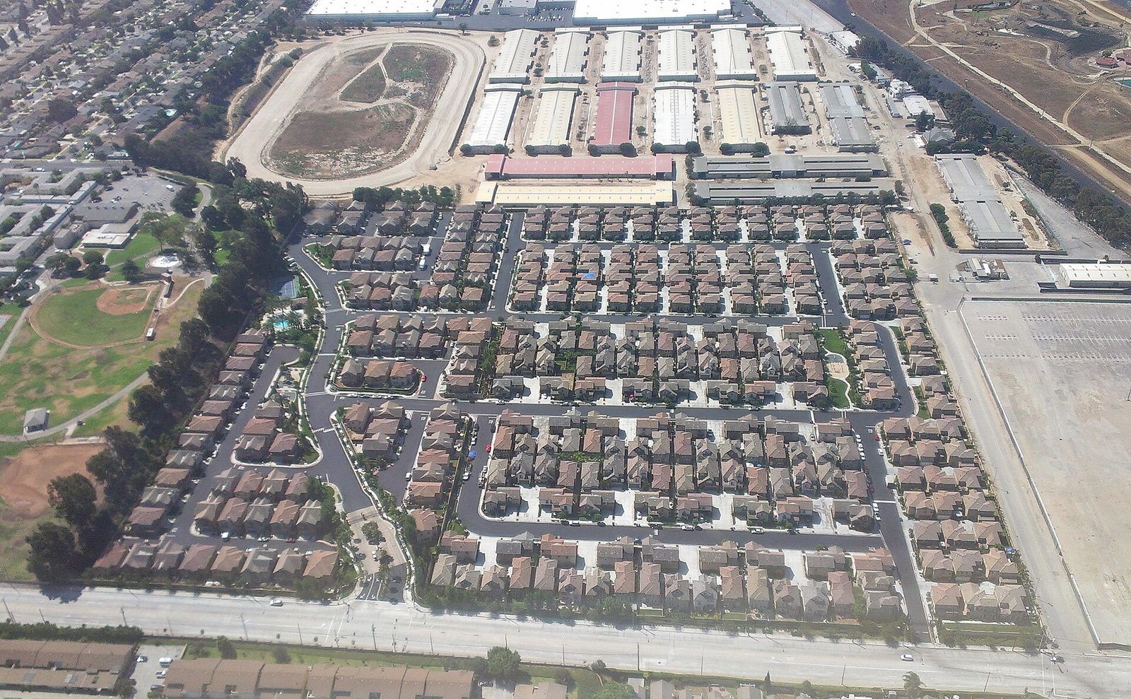 Aerial view of residential neighborhoods, streets and community infrastructure